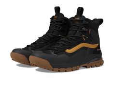 Vans Ultrarange Exo Hi GORE-TEX(r) MTE-3 - Shoes : Black/Gold : The Vans Ultrarange Exo Hi GORE-TEX MTE-3 is loaded with tech and features to keep you protected from the elements while retaining the classic street style you love. High-top snow boot with full-lace closure and molded heel/toe protection. Front and rear pull-tabs for easy on and off with top speed hooks for a secure fit. Leather and textile upper with MTE-3 GORE-TEX WATERPROOF PACKAGE. Textile lining features Thinsulate cold weathe Vans Boots, Classic Street Style, Boots 2024, Vans Ultrarange, 3 Shoes, Snow Boot, Bike Trips, Vans Shop, Sneaker Collection