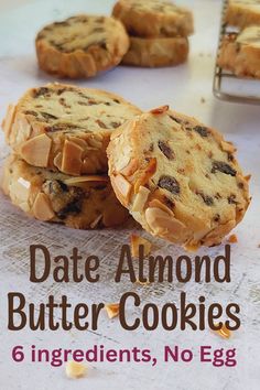 some cookies are stacked on top of each other and the title says date almond butter cookies 6 ingredients, no egg