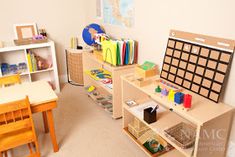 a child's playroom with toys and books