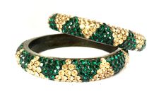 GREEN GOLD CRYSTAL BANGLES This is a beautiful Bangle pair of 2 Gorgeous Green & Gold crystal bangles. The crystals sparkle from a distance. They are swarovski crystals of top quality. handmade bangles These are slip on and very easy to wear.They will fit almost all adult wrist sizes. A one of a kind piece. Beautiful Bangles set to own Thank you for looking. Inner diameter 2.5 INCHES perfect for Medium- Large wrist size. SIZE 2.8 PLEASE NOTE: You will receive 2 bangles in one order. Go back Nepal Jewelry, Beautiful Bangles, Bangles Set, Bangles Indian, Crystal Bangle, Handmade Bangles, Gold Statement Necklace, Stacked Bangles, Gold Crystal