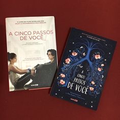 two books sitting on top of a red table next to each other, one is written in spanish and the other has an image of a woman's face