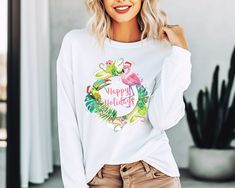 This Christmas flamingo shirt makes a great beach lovers gift. Great for a coastal Christmas. A tropical holiday tshirt with a pink flamingo is beach chic and gives you a feeling of being on the beach, in the warm tropical breeze. Close your eyes and picture the swaying palm trees and the soft sand underfoot. Awww... Feel the tropical Christmas vibes in this unisex tee. 🌴 100% Soft cotton  🌴 Runs true to size - unisex sizing View more Christmas shirts here: https://www.etsy.com/shop/BeachChicAndMore?ref=seller-platform-mcnav&section_id=30540091 Check out our coastal Christmas decor and mugs: https://www.etsy.com/shop/BeachChicAndMore?ref=seller-platform-mcnav§ion_id=28635371 Holiday Crew Neck Tops For Beach Season, Fun Holiday Beach Tops, Fun Beach Season Holiday Tops, Crew Neck Tops For Beach Season Holiday, White T-shirt For Beach Holiday, White Tops For Beach Season Holiday, Beach Tshirts, Tropical Xmas, Christmas Flamingo