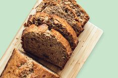 sliced loaf of banana bread on a cutting board