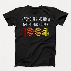 a black t - shirt with the words making the world a better place since 1994