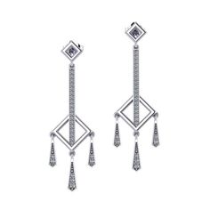 These Diamond Square Dangle Earrings are inspired with geometric details. Luxury Pave Set Diamond Dangle Earrings, Luxury Diamond Dangle Earrings With Pave Setting, Classic Chandelier Earrings With Diamond Accents For Evening, Drop Earrings With Single Cut Diamonds, Luxury Drop Earrings With Pave Setting, Classic Diamond Chandelier Earrings With Diamond Accents, Classic Diamond Chandelier Earrings With Brilliant Cut, Diamond Earrings With Single Cut Diamonds For Evening, Diamond White Earrings With Single Cut Diamonds For Evening