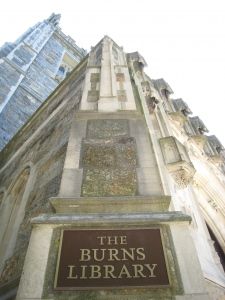 the burns library sign is posted in front of an old building