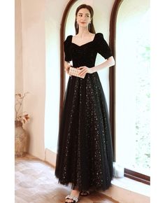 Buy long black retro bubble sleeved party dress with bling stars at wholesale price online. Free shipping and pro custom service since 2009. Black Sequined Full Length Dress, Black Sequined Full-length Dress, Black Full Length Evening Dress, Black Full-length Evening Dress, Black Evening Dress For Winter Night Out, Black Evening Dress For A Winter Night Out, Black Evening Dress For Night Out In Winter, Black Winter Evening Dress For Night Out, Black Evening Dress For Holiday Banquet