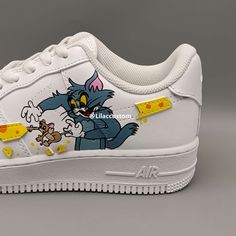 "Customize your kicks with the Nike Air Force 1 Cartoon Character Custom. Express your personality with a one-of-a-kind design featuring your favorite cartoon character. Expertly crafted for comfort and durability. Upgrade your sneaker game today." ★ Brand new with box ★ Each pair is unique and one of a kind ★ Each pair is personally handmade, painted with high quality Angelus. ★ Leather acrylic paint. Topped with a clear coat for extra protection. ★ Available in all sizes including men and wome Sporty Sneakers With Character Print For Streetwear, Casual Custom Sneakers With Character Print For Streetwear, White High-top Sneakers With Cartoon Print, Sporty High-top Sneakers With Character Print, Cartoon Print Sneakers For Streetwear, White Cartoon Sneakers For Streetwear, Cartoon Print Sneakers With Round Toe, Cartoon Low-top Sneakers For Streetwear, Cartoon Style Low-top Sneakers For Streetwear