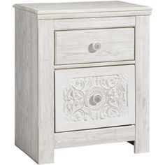 a white wooden nightstand with carvings on the front and side drawers, one drawer open