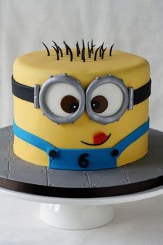 a birthday cake with a minion face on it