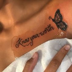 a woman with a butterfly tattoo on her chest that says, know your worths