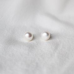 SLVR New York Classic Pearl Earrings Material: Sterling Silver Detail: Simple Pearl Studs 925 Silver Plane Skincare, Winx Costume, Crochet Crocodile, Classic Pearl Earrings, Beauty Wishlist, Natural Pearl Earrings, Academia Outfits, Crocodile Stitch, Crochet Earrings Pattern