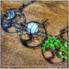 Three more gorgeous pieces of wearable art fresh off the PhoenixFire Designs workbench last night! Crescent moon and stars, 16mm natural rainbow moonstone, and brown wire apple tree. Which handcrafted tree of life pendant is your favorite? Nature-inspired Wire Wrapped Round Jewelry, Nature-inspired Round Wire Wrapped Jewelry, August Birthstone Necklace, Tree Tree, Red Jade, August Birthstone, Bracelet Chain, Pallet Ideas, Tree Of Life Pendant