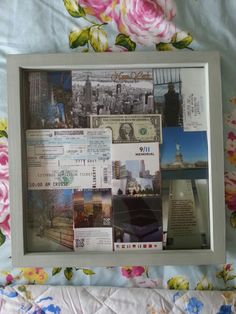 a collage of photos is displayed in a frame on a bed with pink flowers