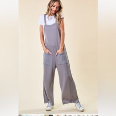 Soft Terry Sweatshirt Jumpsuit Overall Style Double Button Straps Front Pockets Easy Fit Spring Cotton Gray Jumpsuits And Rompers, Casual Gray Cotton Jumpsuits And Rompers, Casual Overalls With Button Closure For Workwear, Casual Cotton Overalls With Buttons, Casual Gray Jumpsuits And Rompers For Work, Cotton Loungewear Jumpsuits And Rompers With Buttons, Cotton Jumpsuits And Rompers With Buttons For Loungewear, Casual Relaxed Fit Jumpsuits And Rompers With Buttons, Casual Relaxed Fit Overalls With Buttons