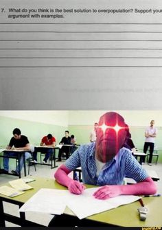 a man sitting at a desk in front of a computer monitor with his head glowing