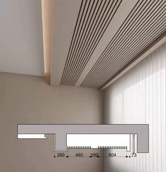 a room with white walls and vertical blinds on the ceiling is shown in this drawing