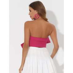 Women's cropped bandeau top with sleeveless, a front large bow, and a sweetheart neck design, is a perfect choice for a boldly feminine and stylish look. The sweetheart neckline accentuates your curves, while the strapless design adds a touch of charm. The bow detail on the front adds a playful element to the overall aesthetic. Whether you're heading to a party or a night out on the town, these crop tops are sure to turn heads. Trendy and cute style, the bow tie strapless crop top paired with sk Glamorous Bandeau Crop Top For Spring, Glamorous Strapless Crop Top For Spring, Trendy Party Cropped Tube Top, Trendy Cropped Tube Top For Party, Glamorous Bandeau Crop Top For Summer, Flirty Pink Crop Top For Party, Trendy Party Crop Top Tube Top, Trendy Crop Top Tube Top For Party, Chic Pink Cropped Tube Top