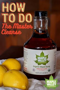 a bottle of maple syrup next to lemons on a towel with the words how to do the master cleanse