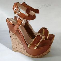 Brown Open Toe Wedge Sandals In Faux Leather, Brown Open Toe Faux Leather Wedge Sandals, Brown Faux Leather Open Toe Wedge Sandals, Brown Faux Leather Wedge Heel Sandals, Brown Faux Leather Wedge Sandals, Brown High Heel Wedge Sandals For Party, Brown Wedge Sandals For Party With Round Toe, Leather Buckle, Platform Wedges