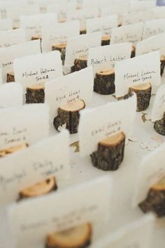 many pieces of wood with place cards on them