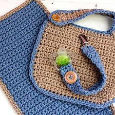 a crocheted purse with buttons on it