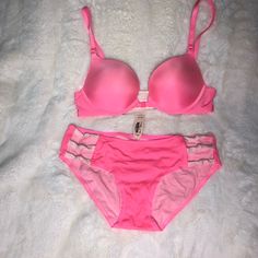 Beautiful Victoria Secrets Push Up Front Close Bra And Under Wear Set In A Pastel/Baby Pink. Decorative Knot Feature On Back Of Bra And On The Sides Of Underwear. Bra Very Gently Used, Underwear Nwt. Bra Is Size 32b And The Bottoms Xsmall. (32b Sister Size Is 34a)These Items Are Personally Mine And In Awesome Condition. Please Look Over The Pictures As What You See Is The Item You Will Be Receiving. As Always Thank You For Viewing My Closet. Pink Bra And Under Set, Under Wears Woman Set, Front Close Bra, Blue Lace Bra, Gray Sports Bra, Nude Bra, Pink Bralette, Unlined Bra, Victoria Secret Sport