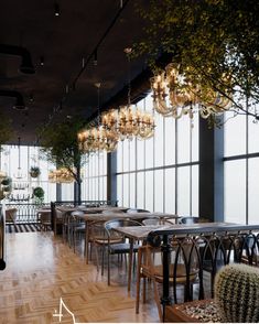 an empty restaurant with wooden tables and chairs