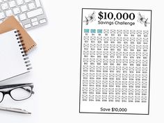 a calculator, pen and eyeglasses next to a paper with savings challenge on it