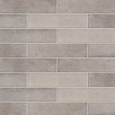 a close up view of a grey brick wall