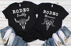 These matching family shirts are the perfect shirts for the family at the rodeo! HOW TO ORDER more than one: click the dropdown tab and click on a size. Click the next dropdown tab to choose your shirt and add to cart. Go back to the listing and choose another size. Choose your quote. Click add to cart. When you click on your cart, both shirts will be there. Repeat for more. Feel free to message me with any questions! This t-shirt is everything you've dreamed of and more. It feels soft and light Custom Print Black Top For Family Gatherings, Father's Day Graphic Print Tops For Family Gatherings, Black Custom Print Top For Family Gatherings, Black Tops With Custom Print For Family Gatherings, Black Graphic Print T-shirt For Family Gatherings, Black Short Sleeve Top For Family Gatherings, Black T-shirt With Custom Print For Family Events, Black Tops With Graphic Print For Family Reunion, Black Graphic Print Tops For Family Reunion