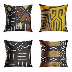 four pillows with different designs on them, one is yellow and the other is black