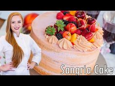 there is a cake with fruit on it and the words sangara summer cake above it