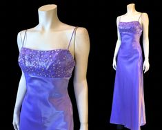 VINTAGE LAVENDER PURPLE FORMAL GOWN Stunning Iridescent Lavender Floor Length Slip Dress with Empire Waist and Thin Shoulder Straps and 2 sets of Strappy Ties across the dramatic Open Back. Dress Zips in Back from Hips to Lower Back. Bodice is covered in Iridescent Floral Sequins and Purple Beads. BY: Alfred Angelo SIZE: approximate XS CONDITION: Very Good. A few faint marks on lower front skirt (see pics ).  MEASUREMENTS Bust 32" Waist 26" Hips 35" Length 59" SHIPPING Canada: shipping listed is Formal Slip Dress, Lavender Prom Dresses, Vintage 90s Dress, Iridescent Dress, Vintage Lavender, Alfred Angelo, Purple Beads, Corset Back, Kawaii Fashion Outfits