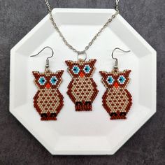 mbrace the charm of nature with this adorable owl jewelry set, featuring dangle earrings and a matching pendant necklace. Handcrafted in a delightful boho style, these pieces are designed with intricate owl motifs in soft brown and beige shades. Perfect for nature lovers, this set adds a whimsical touch to any outfit, whether you're dressing up or keeping it casual. The lightweight dangle earrings and pendant make for a comfortable and stylish accessory that's ideal for daily wear. Whether you'r Beige Shades, Boho Mode, Owl Jewelry, Writing Gifts, Fan Earrings, Brown And Beige, Cute Owl, Chic Jewelry, Gifts For Nature Lovers