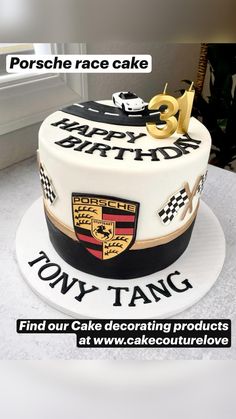 a birthday cake with the number thirteen on it and an image of a racing car