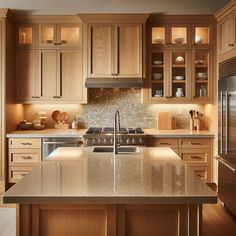 a large kitchen with wooden cabinets and stainless steel appliances, along with an island in the middle