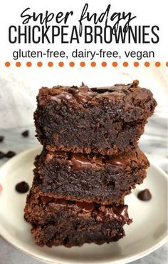 three chocolate brownies stacked on top of each other with the title super fudgey chickpea brownies gluten free, dairy - free, dairy - free, vegan