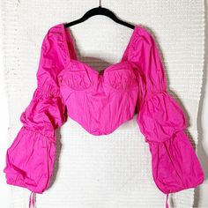 Majorelle Tawny Corset Top. Hot Pink. Long Puffed Sleeves. Sweetheart Neckline. Cropped. Previously Sold On Revolve. Measurements: 15” Bust, 14” Length Material: 92% Cotton, 8% Spandex Condition: Brand New With Tags. Small Flaw In Back Of Sleeve. Puff Sleeve Crop Top, Long Puff Sleeves, Puffed Sleeves, Corset Top, Sweetheart Neckline, Puff Sleeve, Hot Pink, Crop Top, Womens Tops