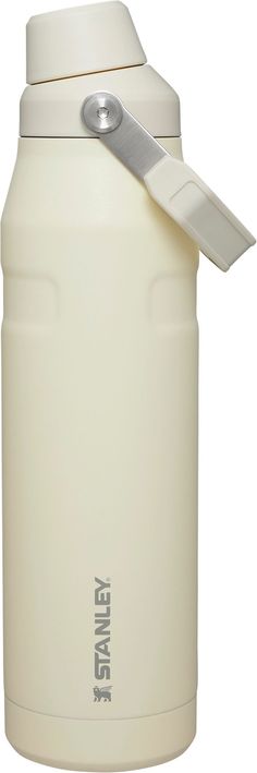 a white water bottle with a knife sticking out of it's top and lid