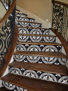 the stairs are decorated with black and white designs