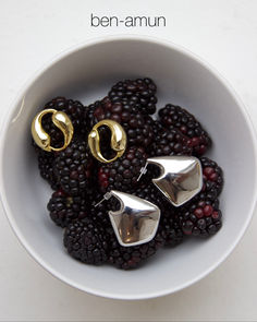 a bowl of blackberries with modern gold earrings and silver earrings on top New Earrings, Fall Collection, Fall Collections