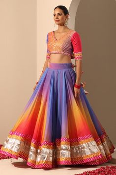 Multi colored lehenga with gota and lampi border. Comes with multi colored back tassel blouse with gota work and soft net dupatta.
Components: 3
Neckline: V Neck
Sleeve Type: Elbow
Fabric: Lehenga and Blouse: Organza, Dupatta: Soft Net
Color: Multi Color
Other Details: 
Length:
Lehenga: 40 inches
Dupatta: 2.5 mtrs
Dupatta width: 44 inches
Note: Potli bag held by the model is not for sale
Occasion: Destination Wedding - Aza Fashions Multicolor Fusion Traditional Wear For Wedding, Multicolor Bollywood Lehenga With Unstitched Blouse, Fusion Style Multicolor Cutdana Lehenga, Fusion Style Multicolor Lehenga With Cutdana, Multicolor Lehenga With Unstitched Blouse For Festivals, Fusion Style Multicolor Sets With Cutdana, Fusion Style Multicolor Cutdana Sets, Fusion Multicolor Sets With Cutdana, Fusion Multicolor Cutdana Sets