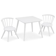 a white table and two chairs sitting next to each other