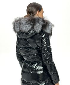 Description: Alaska`s luxurious warm yet lightweight parka insulated with white duck down and trimmed with genuine Silver fox fur. This mid-length parka is crafted from the durable Arctic Tech fabric that is designed to face harsh elements. 2 in 1 style: fully removable fur turns parka to beautiful puffer coat. Product Details: Temperature range: up to -25°C/-13°F Trim: genuine Silver Fox fur Filling: 90% white duck down, 10% white feather Please note: product color may slightly vary due to phot Black Faux Fur Jacket, Quilted Puffer Jacket, Black Down, Padded Coat, Belted Coat, Winter Coats Jackets, Fur Hood, Silver Fox, Down Parka