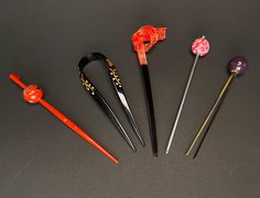 These are Kanzashi with hand painted with flowers pattern and Base made from resin/wood/metal with traditional Japanese designs. *Follow us for More. We update almost EVERYDAY! *Fast Shipping from US. No more waiting from Japan. A. Red Hair Stick, Kanzashi  Approximate Size:  Check final 2 photos for reference Material: Resin Condition: In Excellent condition like NEW. Check photos/video B. Black U Shape Hair pin, Kanzashi Approximate Size:  Check final 2 photos for reference Material: Resin Condition: In Excellent condition. Check photos/video C. Red& Black Hair Stick, Kanzashi  Approximate Size:  Check final photo for reference Material: Resin Condition: In Excellent condition. Check photos/video D. Pink Hair Tama, Kanzashi Approximate Size:  Check final photo for reference Material: Met Red Black Hair, Kimono Geisha, Japanese Kanzashi, Black Red Hair, Japanese Designs, U Shaped Hair, Comb Hair, Japan Design, Hair Stick