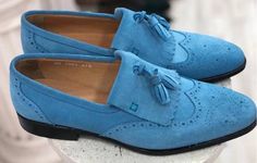 Buy TucciPolo Mens Handmade Luxury Blue Suede Tassel Loafers. TucciPolo shoes are handcrafted by the best shoe makers with guaranteed quality and comfort. Unique in style and exclusively designed for Men who can dress. Shop nowBlue Suede upper, Leather Lining with Leather SoleTwisted suede TasselsThis is a made-to-order product. Each pair will be made upon receipt of order and shipped in approximately 15 days. Because our shoes are hand-painted and couture-level creations, each shoe will have a Blue Wingtip Tassel Loafers With Leather Sole, Elegant Blue Tassel Loafers With Brogue Detailing, Blue Classic Wingtip Tassel Loafers, Classic Blue Wingtip Tassel Loafers, Elegant Blue Tassel Loafers For Galas, Luxury Blue Tassel Loafers With Leather Sole, Elegant Blue Tassel Loafers For Formal Occasions, Design Your Own Shoes, Wingtip Shoes