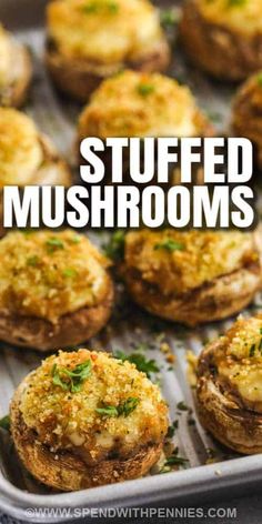 baked stuffed mushrooms on a baking sheet with text overlay