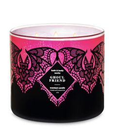 an image of a candle that is pink and black