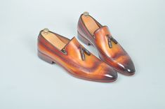 TucciPolo Handmade Luxury Tan Brogue Mens Italian Leather Tassel Loafers Shoes - offering superior comfort and exquisite design. Shop 2018 Tuccipolo Collection of top quality mens Luxury Handmade Italian leather designer Shoes. Leather : Hand polish Italian Leather Sole:Leather insole and outsole Color: Tan This is a made-to-order product. Each pair will be made upon receipt of order and shipped in approximately 15 days. Because our shoes are hand-painted and couture-level creations, each shoe w